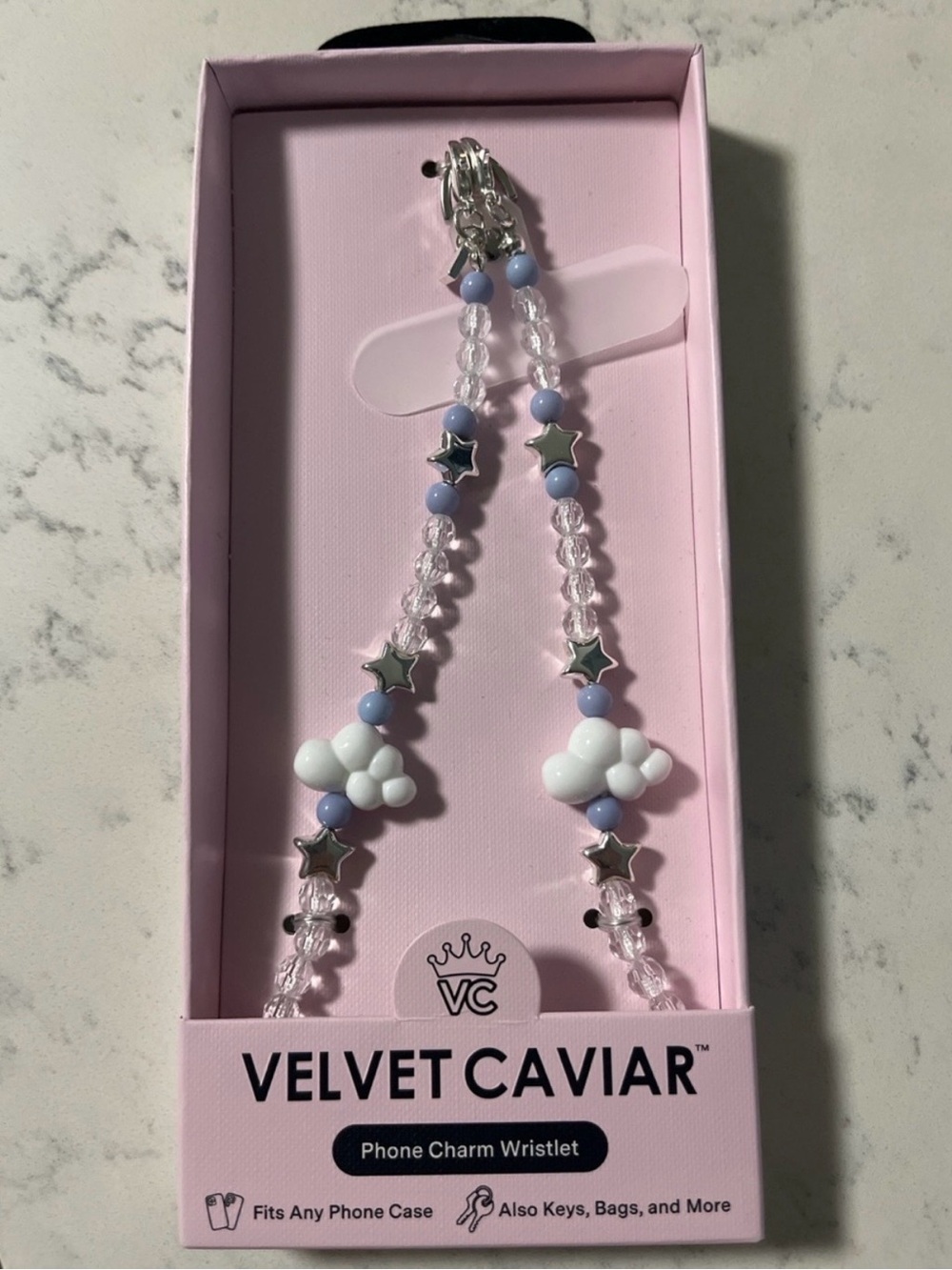 Velvet Caviar In The Clouds Phone Charm